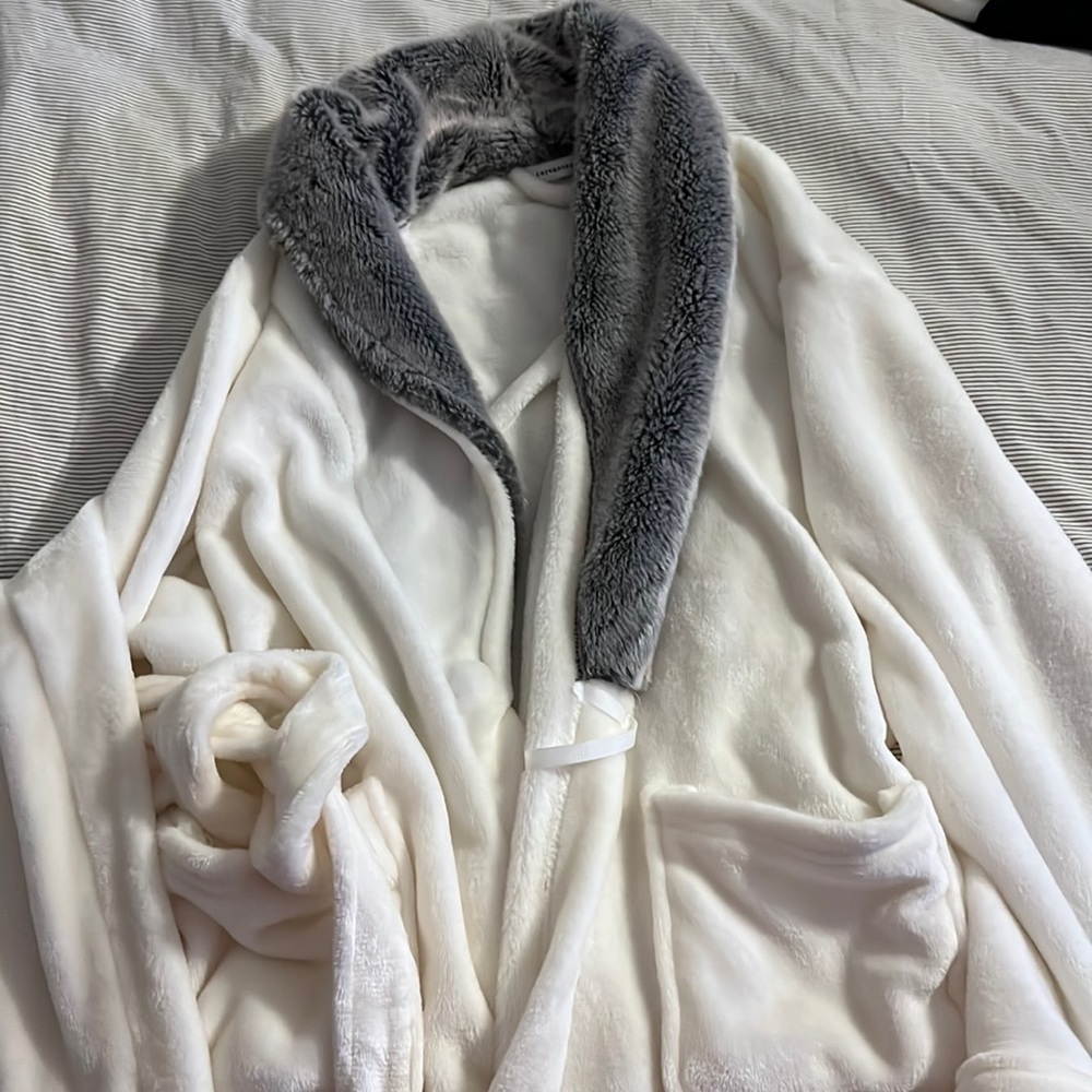 White furry robe with grey collar